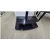 Image 4 : Black Modern TV Stand with Integrated VESA Mount and Two Curved Glass Shelves