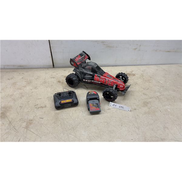 New Bright Baja Extreme Interceptor Remote Control Car with Remote, 6V Battery, and Charger