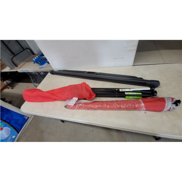 Red Umbrella, Red folding yard chair and Black Cargo Cover divider