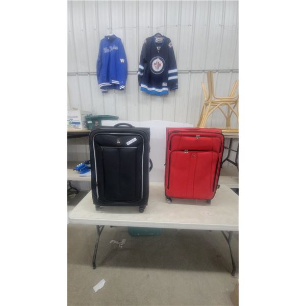 Two Travelpro and Delsey Soft-Sided Rolling Suitcases, Black and Red n.o.s.