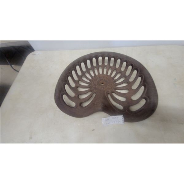 Vintage Cast Iron Tractor Seat, Marked “Toronto”