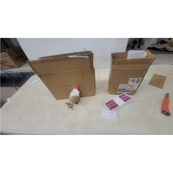 Box of “Chicken” Plush Toys and Box of Pink Candles