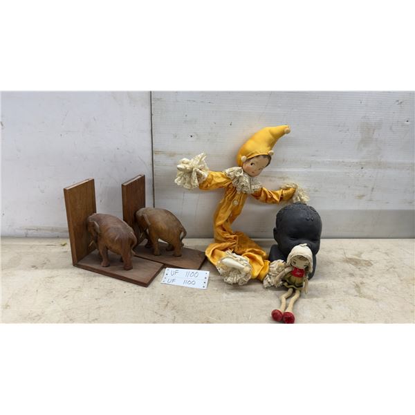 Two Carved Wood Elephant Bookends, Harlequin Doll, Black Doll Head, and Small Cloth Doll