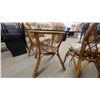 Image 9 : Rattan and Glass Dining Table with 6 Rattan Chairs with Floral Cushions