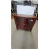 Image 1 : Red and Brown Wood Cabinet with Glass-Front Doors and Brass-Tone Hardware 31”×32”×14.6”
