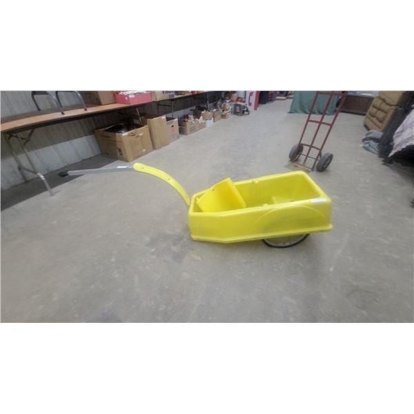 Yellow Snow Sled with Handle, Black Seat, and Two Red Reflectors