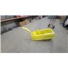 Image 1 : Yellow Snow Sled with Handle, Black Seat, and Two Red Reflectors