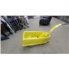 Image 6 : Yellow Snow Sled with Handle, Black Seat, and Two Red Reflectors