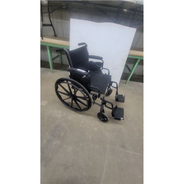 Drive Medical Black Wheelchair with Detachable Footrests and Armrests