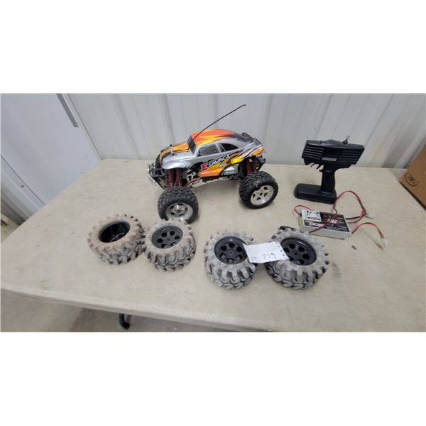 HPI Racing E-Savage RC Truck, Remote Control, Charger, and 4 Extra Tires