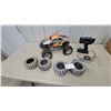 Image 1 : HPI Racing E-Savage RC Truck, Remote Control, Charger, and 4 Extra Tires