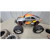 Image 2 : HPI Racing E-Savage RC Truck, Remote Control, Charger, and 4 Extra Tires