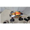 Image 4 : HPI Racing E-Savage RC Truck, Remote Control, Charger, and 4 Extra Tires