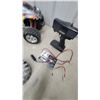 Image 5 : HPI Racing E-Savage RC Truck, Remote Control, Charger, and 4 Extra Tires
