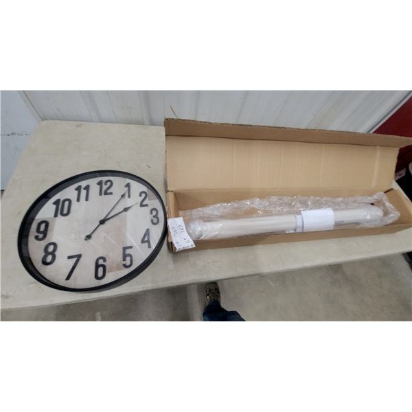 SelectBlinds.ca Roller Shade in Box and Large Wall Clock