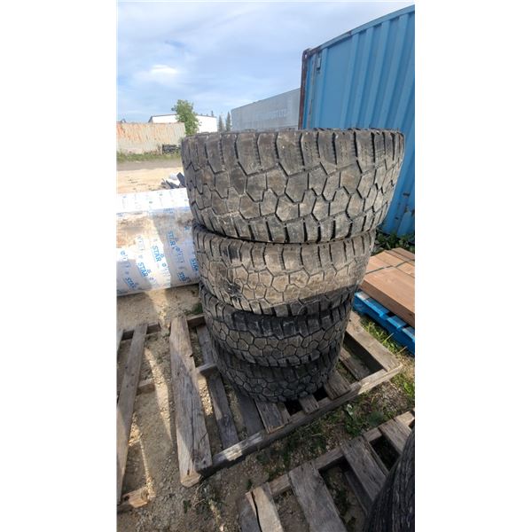 Four Rugged Trek Tires on Black Rims, Size 35 × 12.50R20LT