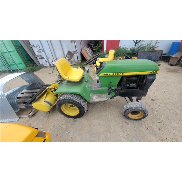 John Deere 300 Lawn and Garden Tractor with Tiller, Mower, and Snow Blower
