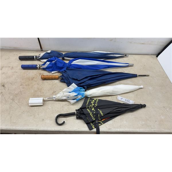 Assortment of Umbrellas Including Blue and White Golf, Pooh and Piglet and Tigger and Eeyore