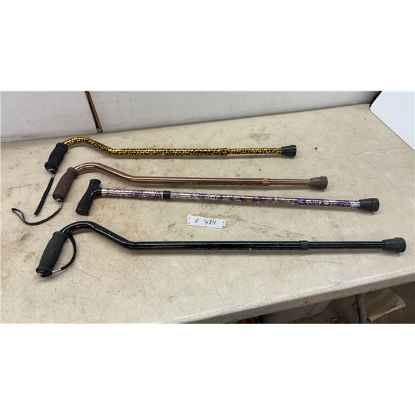 Four Adjustable Aluminum Walking Canes: Leopard Print, Bronze, Purple Floral, and Black