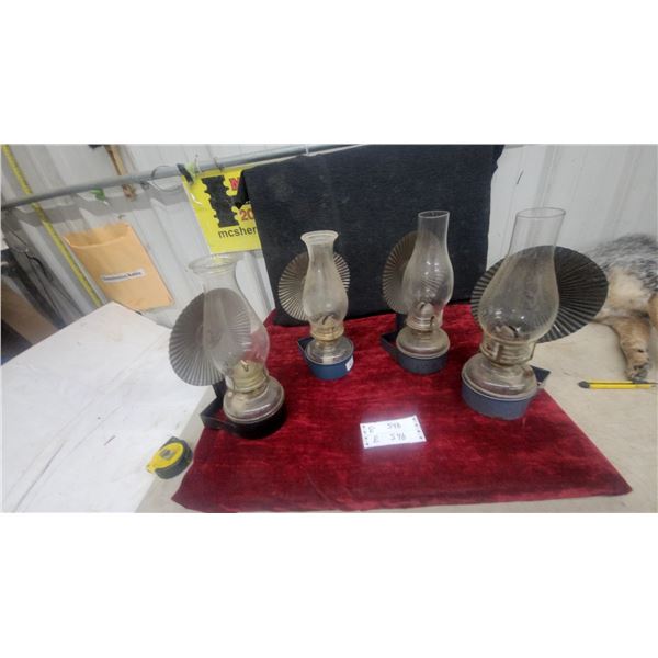 Four Oil Lamps with Reflectors, Clear Glass Chimneys, and Metal wall mount Bases