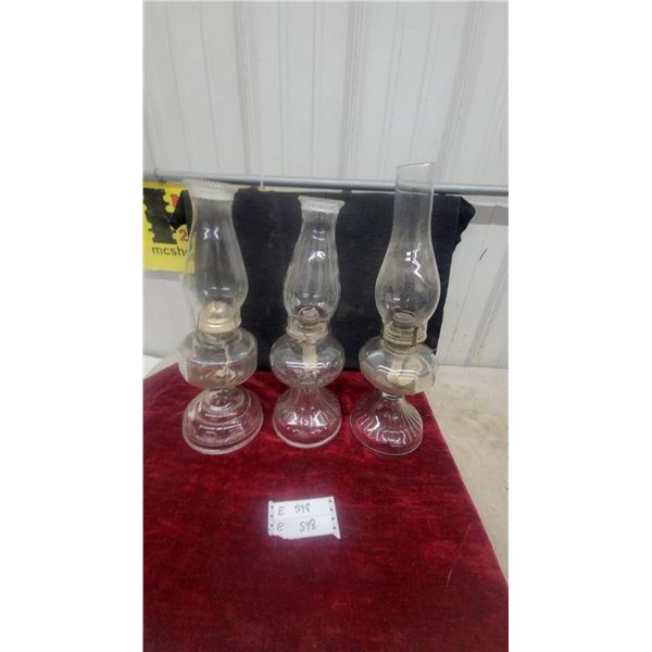 Three Clear Glass Oil Lamps with Chimneys and Wicks