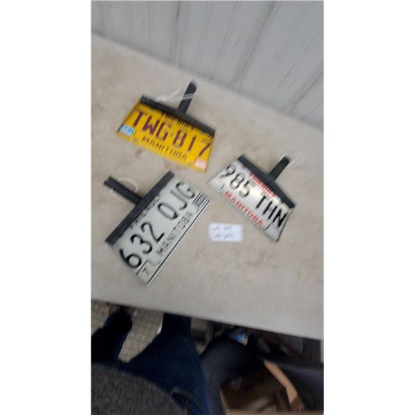 Three Manitoba License Plate Dustpans: 632 QJG, TWG 817, and 985 THN