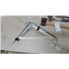 Image 3 : Two Axes, Hand Rake, Two White Metal Brackets, Two Grey Metal Brackets, and Metal Pail