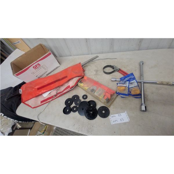 Assorted Tools and Parts: GFS Box, Orange Bag, Black Washers, Socket Wrench, Oil Filter Wrench