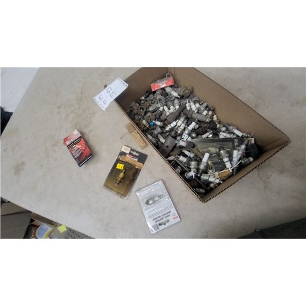 Box of Assorted Spark Plugs, NGK and Briggs and Stratton Spark Plugs, and battery terminals