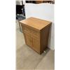 Image 2 : Oak Finish Cabinet on Casters with Drawer and Two-Door Storage