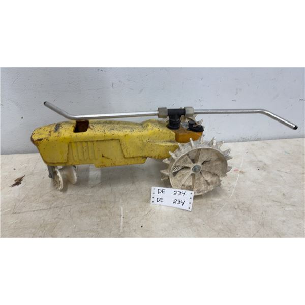 Nelson Traveling Sprinkler, Yellow Tractor-Style, and Sprinkler Arm