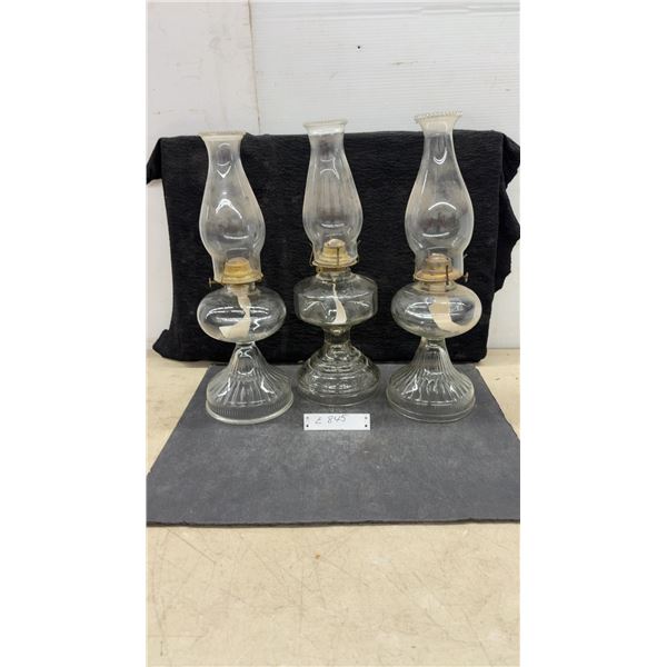 Set of Three Vintage Clear Glass Kerosene Oil Lamps with Ribbed Bases and Chimneys, Tallest 18 1/2”