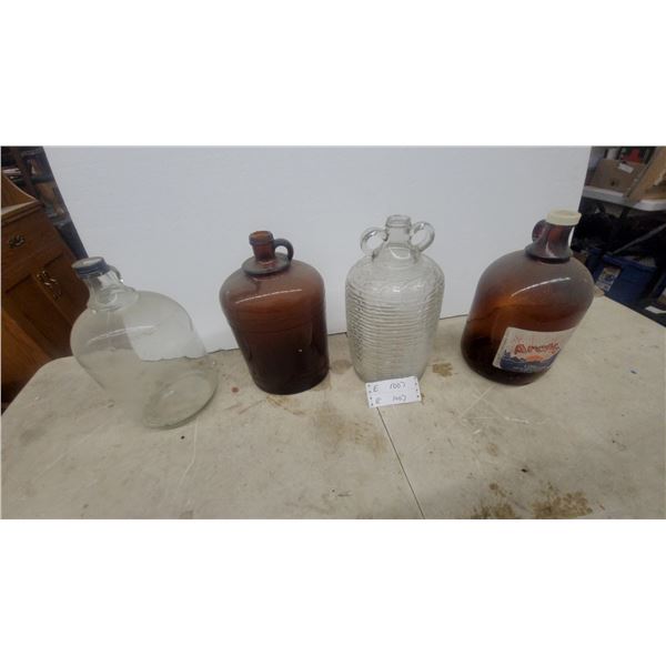 Four Vintage Glass Jugs: Arctic 4 Litres Brown Jug, Brown Jug, Clear Ribbed Jug, and Clear Jug
