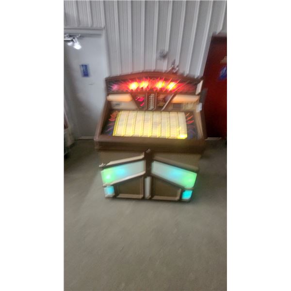 Rowe-AMI R-84 Jukebox, Illuminated, with Coin Slot and Selection Buttons lights up and works
