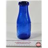 Image 1 : Milk Bottle : "A Bottle of Milk is a Bottle of Health" (Embossed) (Cobalt Blue) (NOTE : Flaw in Glas