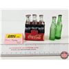 Image 1 : Miniature Coke & Sprite Bottles : - Coke Bottles (6) : In Cardboard Carrier : Bottles Depict Differe