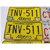 Image 6 : Alberta Licence Plates :  - White (5) - Yellow (8) - Commemorative "Wainwright" (1)