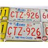 Image 7 : Alberta Licence Plates :  - White (5) - Yellow (8) - Commemorative "Wainwright" (1)