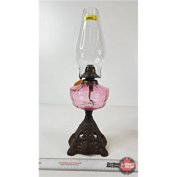 Oil Lamp : Cast Iron Base : Cranberry Glass Font : Oval Chimney (c. 1870) (Measures w/Chimney : 19-3
