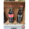 Image 5 : Coca-Cola Full Scale Replica Coke Bottles (8) : Key Dates (1899-1991) c/w Haning or Counter Top Shel