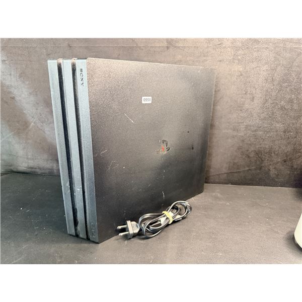 Playstation 4 Pro with Power Cord and Controller - Used Tested Powers On