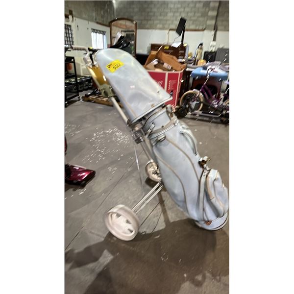 LIGHT BLUE VINTAGE FAUX-LEATHER GOLF BAG WITH CART AND RIGHT HAND LYNX GOLF CLUBS