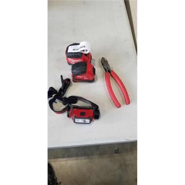 2 MILWAUKEE MEASURING TAPES, MILWAUKEE HEADLIGHT AND WILWAUKEE CUTTING PLIERS