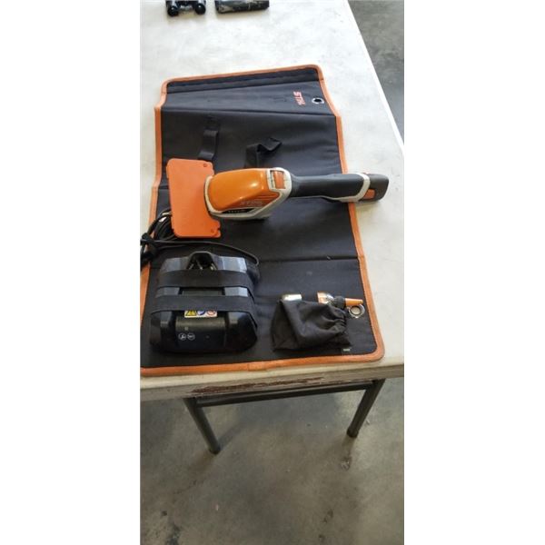 STIHL HEDGE TRIMMER MODEL HSA 26 WITH CHARGER AND MULTIOIL