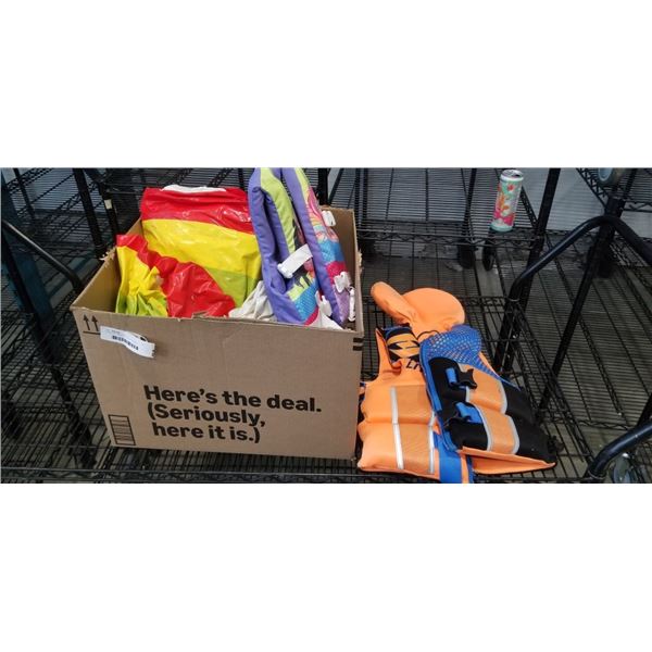 2 KIDS LIFE JACKETS AND A PLASTIC INFLATIBLE