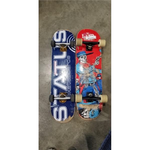 2 SKATEBOARDS. 1 FROM LAND YATCHTZ, 1 FROM STATUS