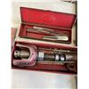 Image 2 : 4 ANTIQUE TINS OF TOOLS - PULLERS AND EASY OUTS