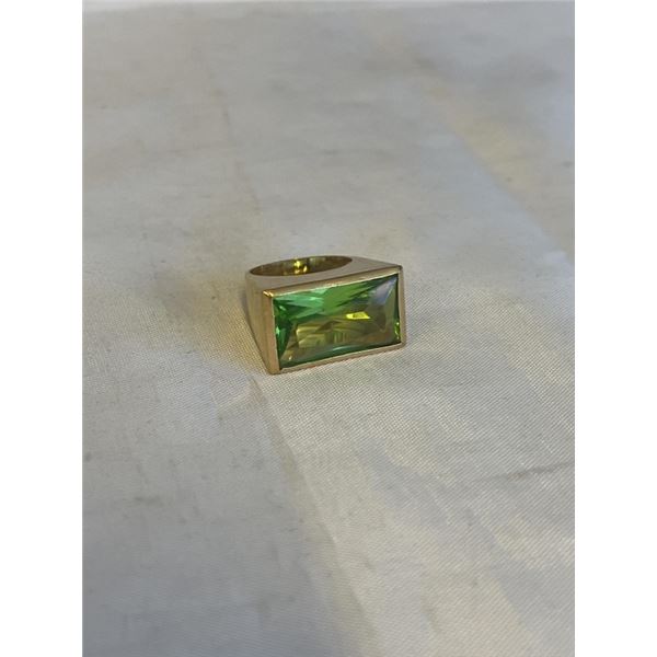 GOLD TONE RING W/ LARGE GREEN STONE