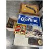 Image 1 : BOX OF ANTIQUE METAL SIGNS AND FRAMED FAKE GUN