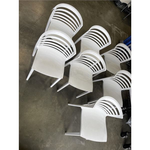 7 STACKING OUTDOOR PATIO CHAIRS. 3 GRAY, 4 WHITE